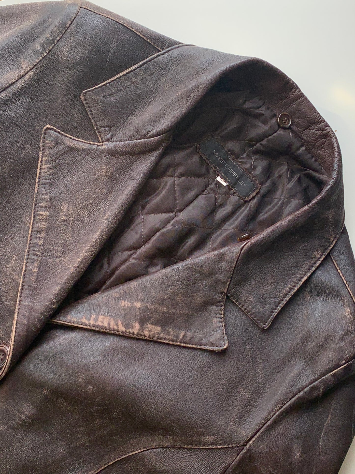 Vintage distressed leather trench coat